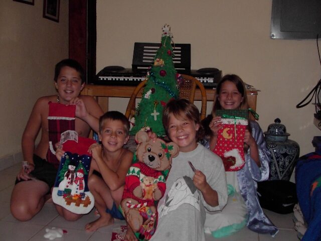 The children with their Christmas stockings during the family's first Christmas in Mexico