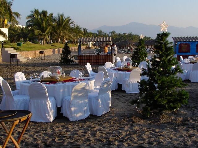 A beachfront Christmas dinner set up on the sand near Bucerias, Riviera Nayarit
