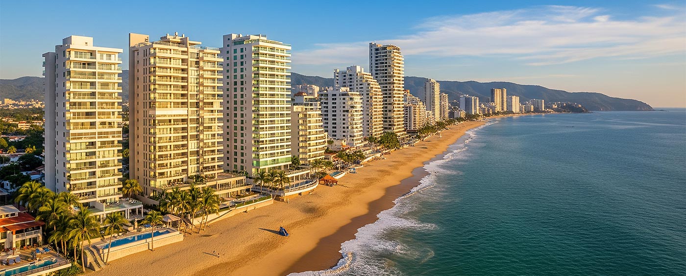 Puerto Vallarta region condos market report featured image: Beachfront condos with ocean views in July 2025, showing rising inventory and pricing trends.
